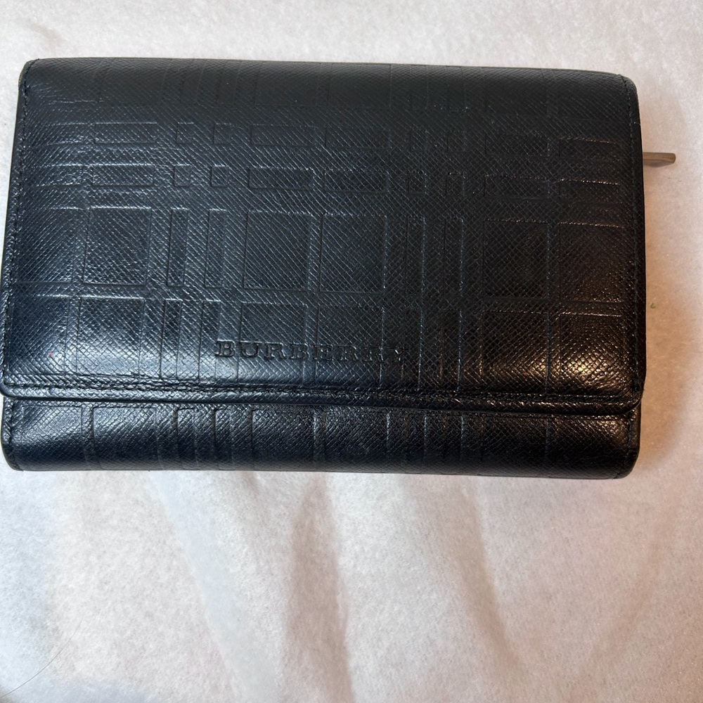 Burberry leather multi-compartment wallet.
